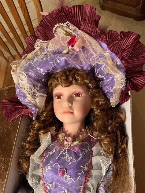 Examine the <b>Doll</b>. . Cathay collection doll